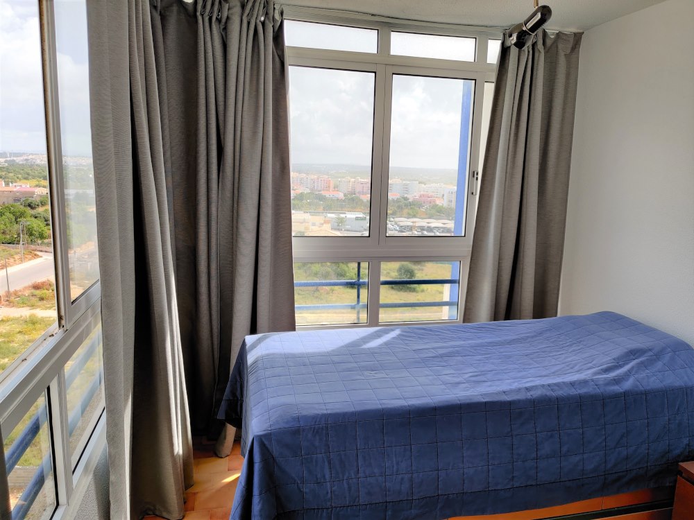 Second bedroom with two single beds at Casa Búzios
