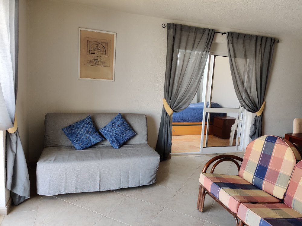 Living room with dining area at Casa Búzios