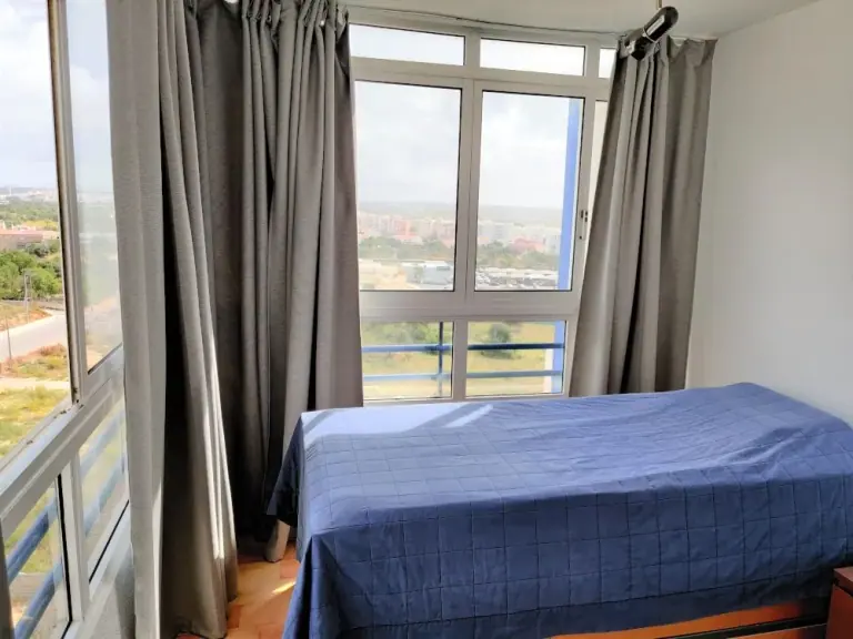 Second bedroom with two single beds at Casa Búzios